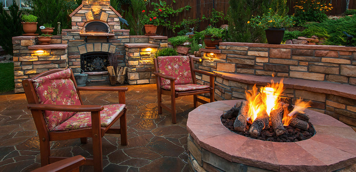 Stone patio with firepit.