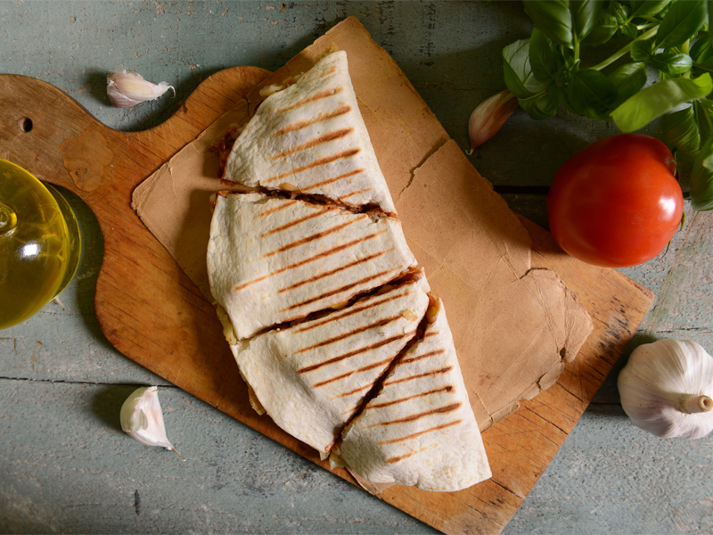 quesadilla on a cutting board