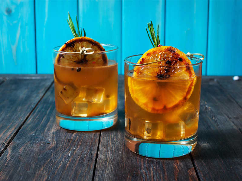 Grilled Lemonade whiskey sours in glass