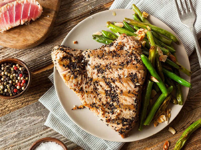tuna and green beans on a dish