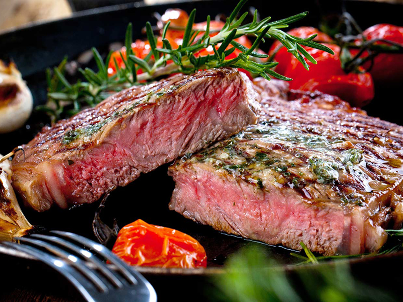 Grilled sirloin skillet sliced in half