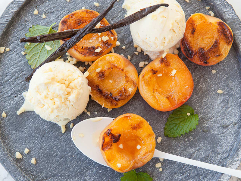 Grilled apricots and ice cream