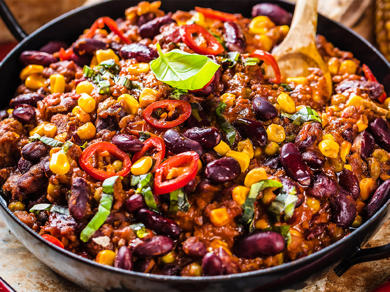 Chili with beans and jalapenos in a bowl 