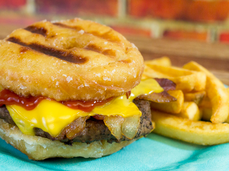 Cheeseburger on a grilled donut