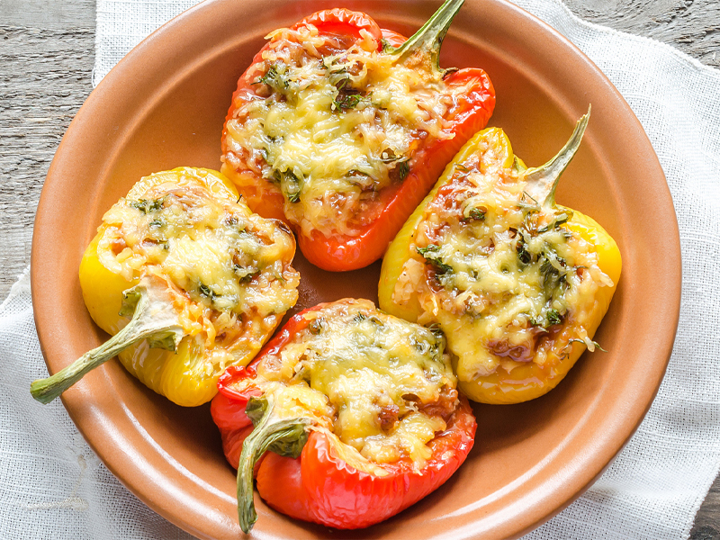 peppers with cheese filling on a plate