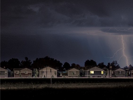 Storm over looking propane generator homes