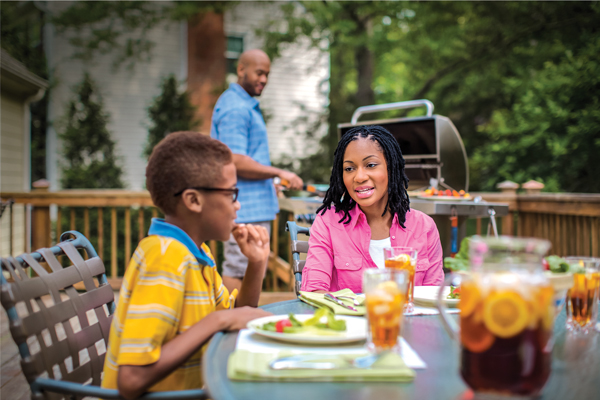 Family grilling outdoors