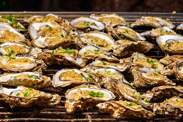 A spread of grilled oysters