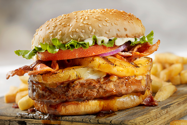 Hawaiin Style Burger served on wood board