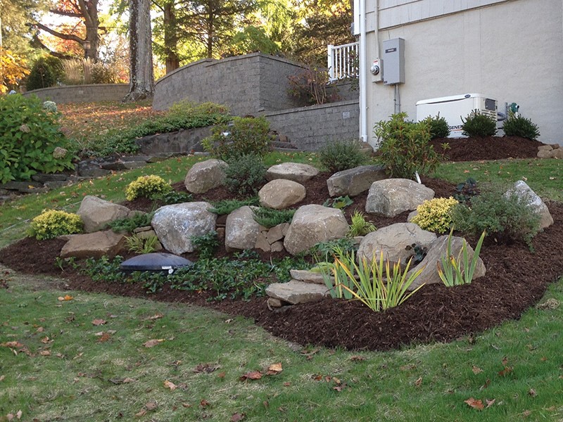 Example of how how to hide propane tank with landscape design hiding underground propane tank cover with with mulch and rocks