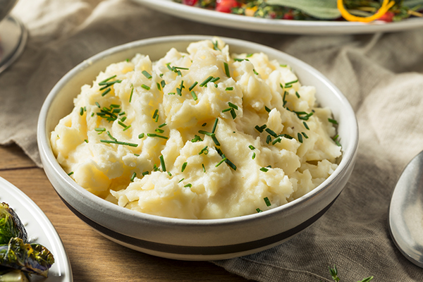 Mashed Potatoes in a bowl with chives on top