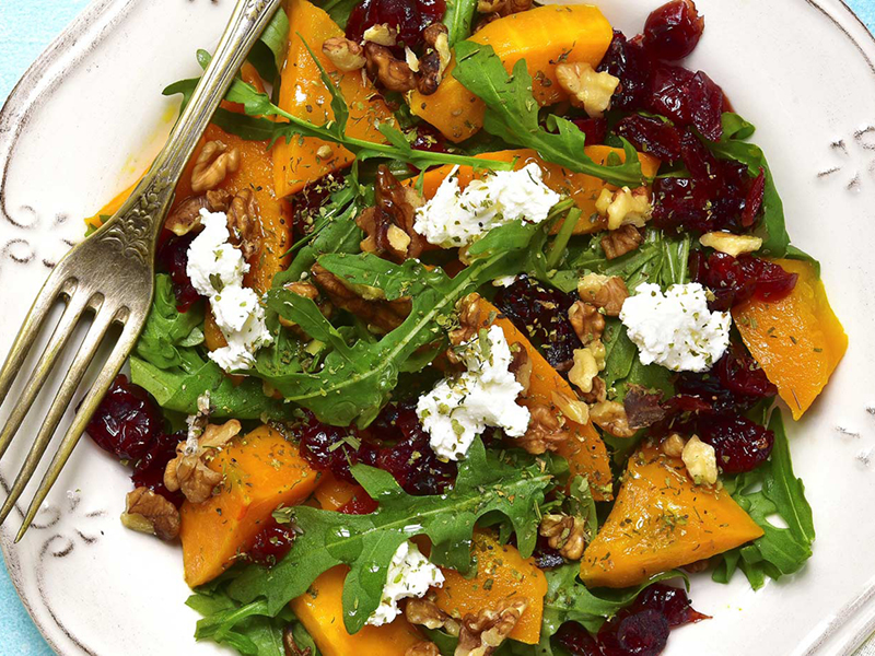 Pumpkin salad prepared with mixed greens