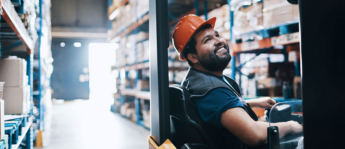 Smiling forklift driver.