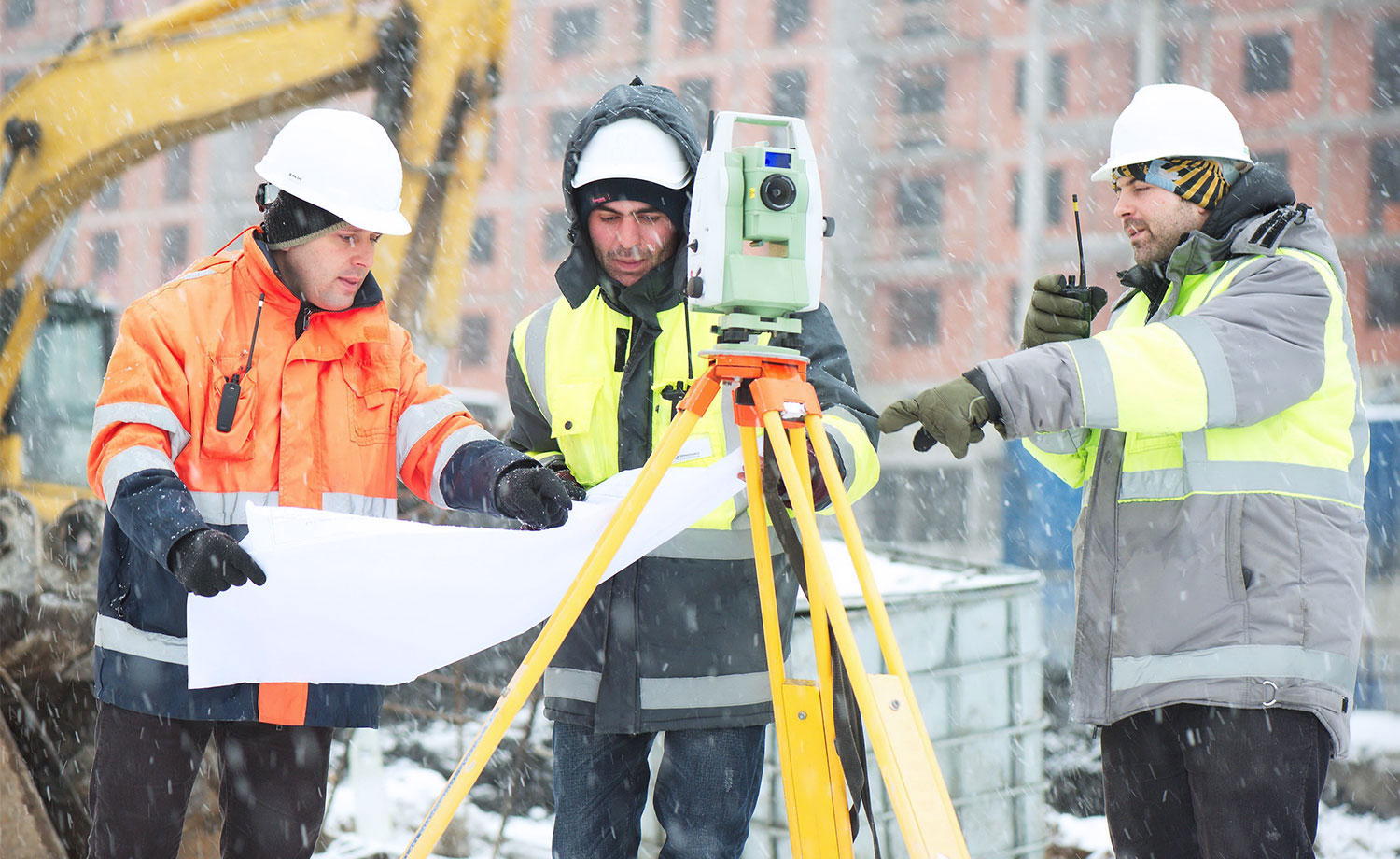 Construction crew looking at plans.