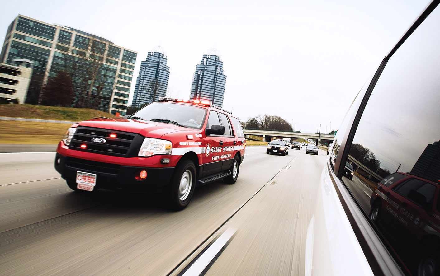 Emergency vehicles on a highway.