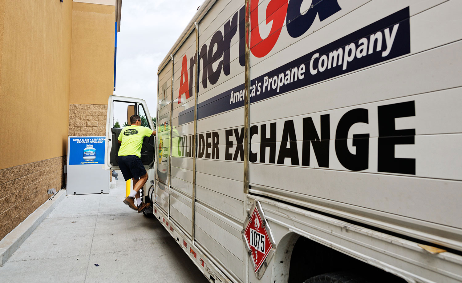 Driver entering a delivery truck.