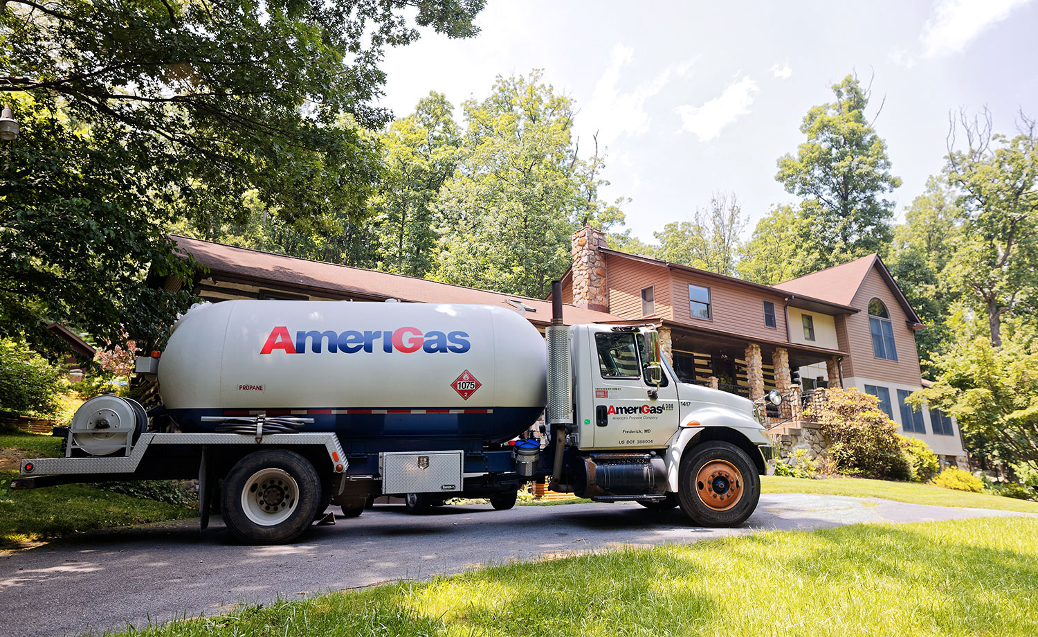 AmeriGas propane truck parked in front of residential propane home