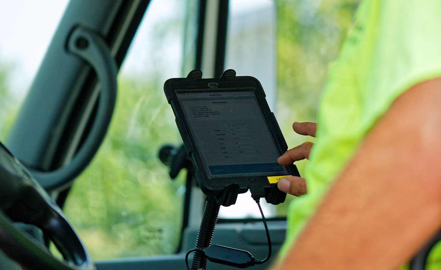 Digital tablet inside truck cabin.