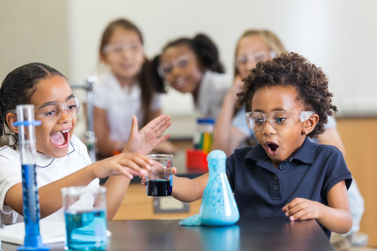 Children sitting at a desk in Science class