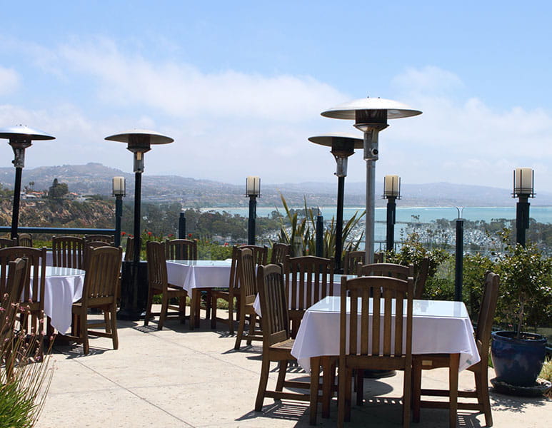 Restaurant patio with propane heaters.