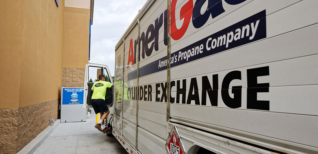 Driver entering a delivery truck.