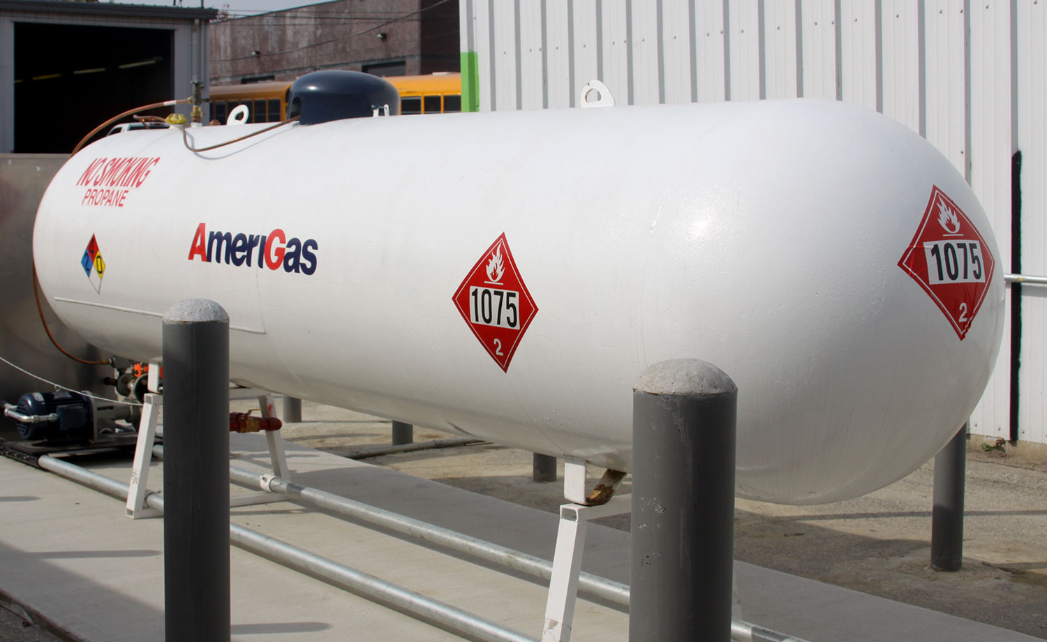 Large propane tank surrounded by security pylons