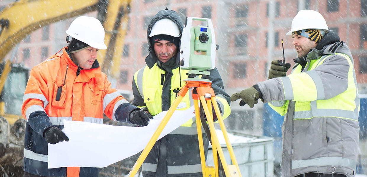 Construction crew looking at plans.